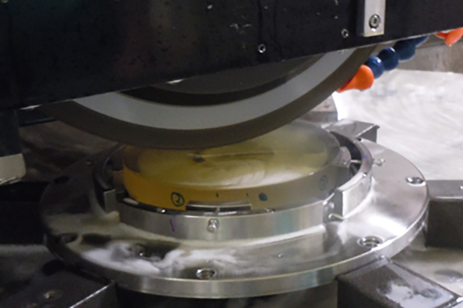 Mirror Surface Grinding of Aspherical Lenses